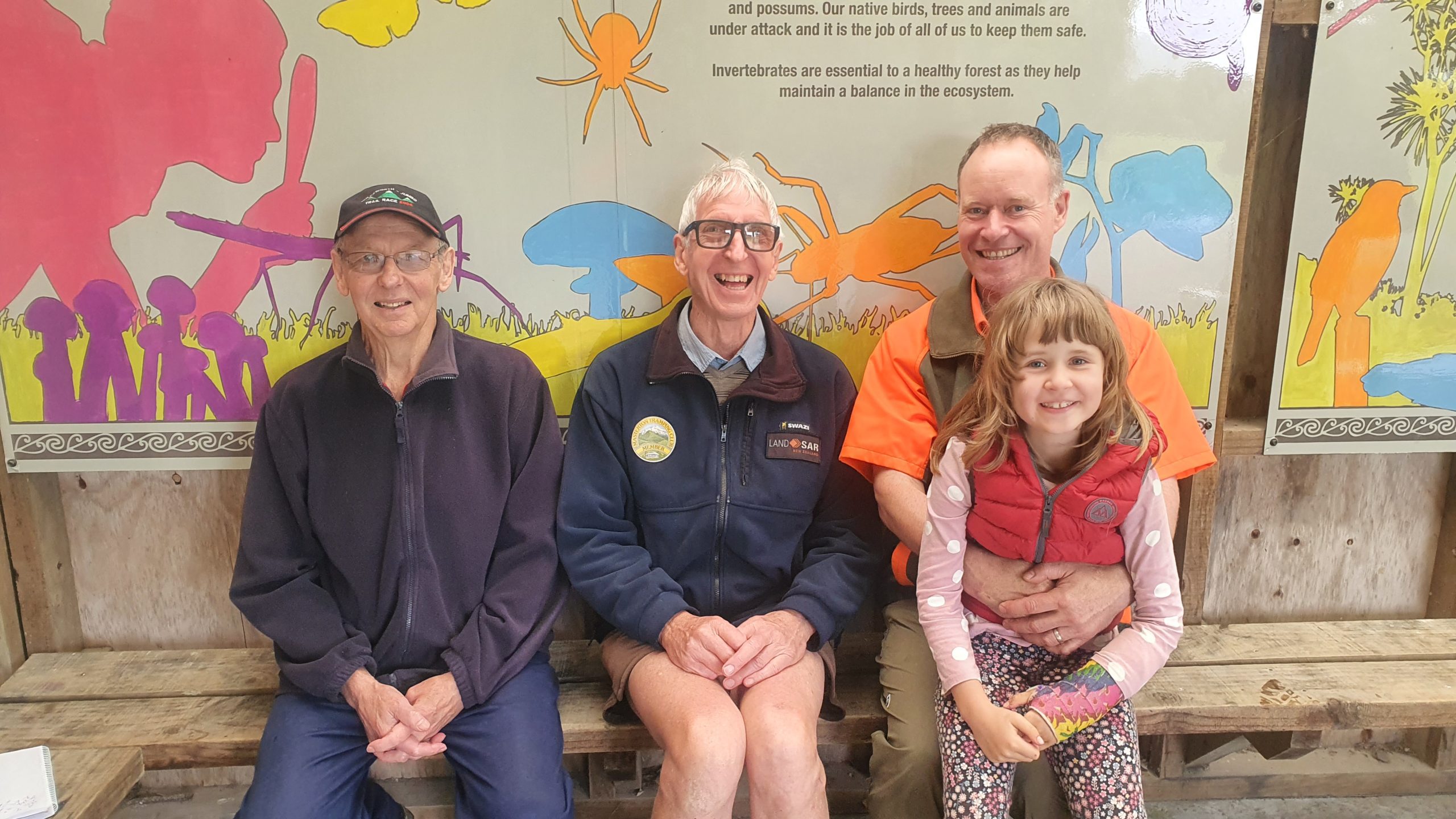 Members of the Project Kaka and Donnelly Flat group, Ian Shanks and Nigel Boniface with DOC Biodiversity Ranger James Harbord and his daughter Estelle. 